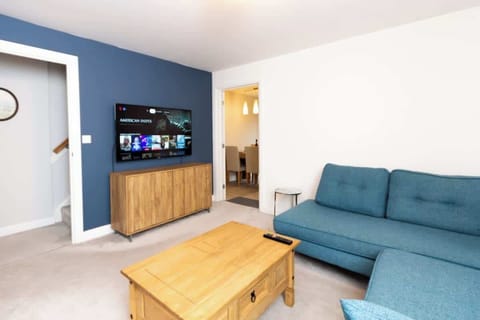 Relax on the comfy sofa while watching films or TV shows.