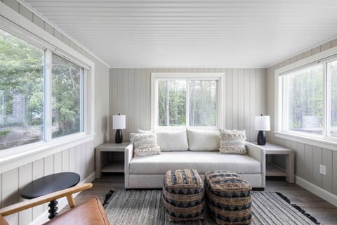 Sunlit coastal comfort—your perfect spot to unwind after a day by the sea. 🌊