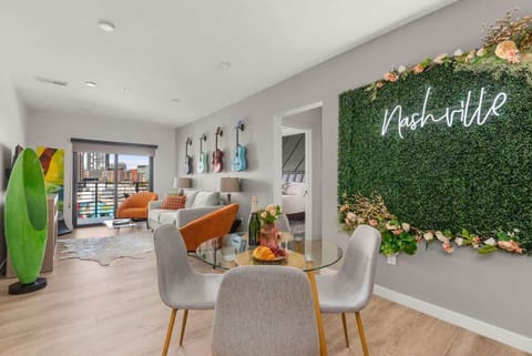 Large living space with everything you can possibly need: umbrellas, yoga mats, dining area, open kitchen, living room with sleeper sofa, access to private balcony, etc