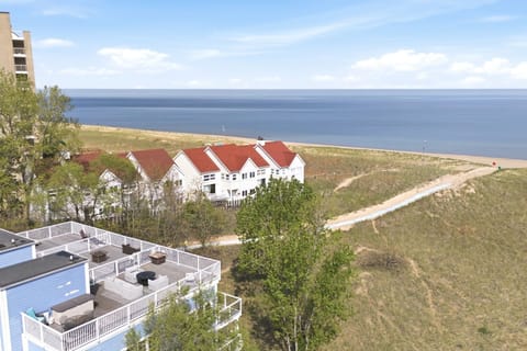 Enjoy serene Lake Michigan views and direct access to the sandy shoreline