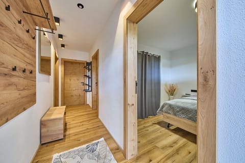 Comfort Apartment, Non Smoking, Lake View | Living area | 50-inch flat-screen TV with cable channels