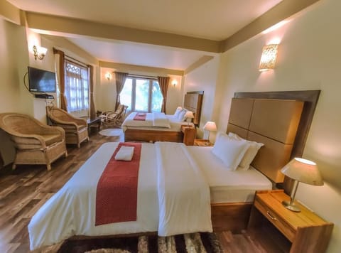 Premium bedding, desk, laptop workspace, iron/ironing board