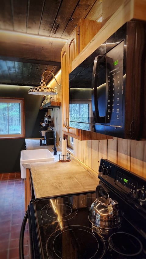 Full Kitchen with Dishwasher, Electric Range, Microwave, and Retro Fridge