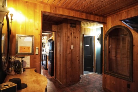 As you walk into The Hideaway from the main entrance next to the driveway and parking area.