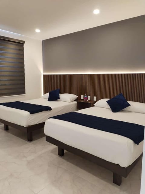 Habitacion Elite Deluxe, Planta Alta (107) | Blackout drapes, WiFi (free), bed sheets