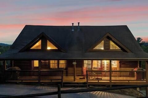 Private cabin entrance and parking for two vehicles