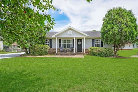 Spacious front yard with a porch.
