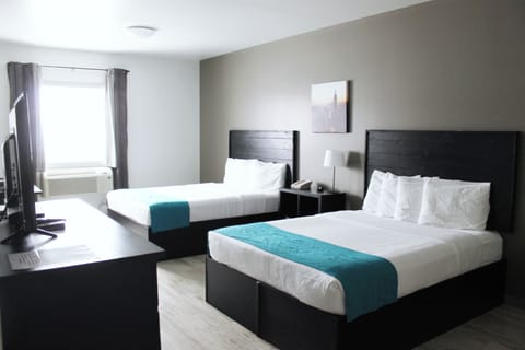 Standard Room, 2 Queen Beds | Laptop workspace, iron/ironing board (on request), WiFi (free)