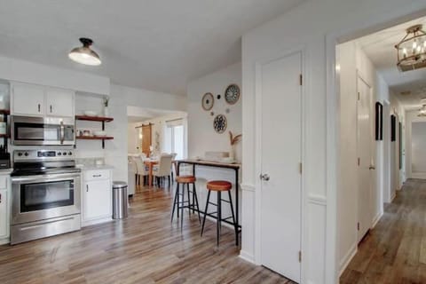Open kitchen with additional dining space.