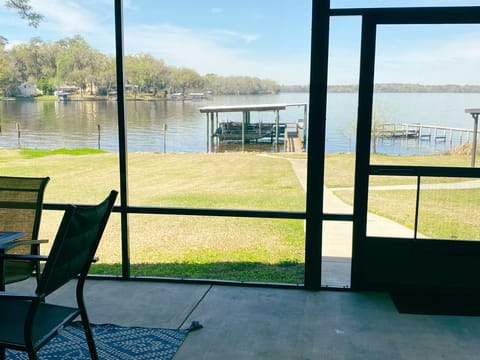 Bottom screened patio looking out to the boat dock.