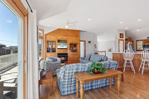 Relax in the spacious Top-Level Living Area! (Please note: Fireplace is not for guest use.)