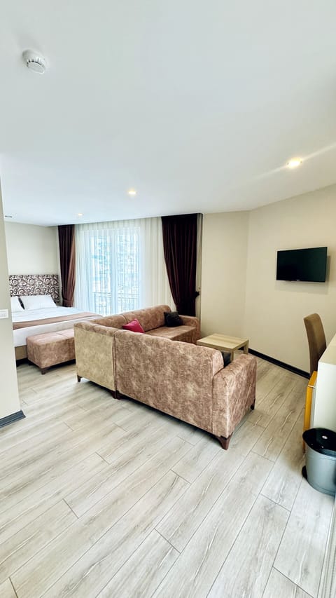 City Suite, 1 Queen Bed, Non Smoking, City View | Minibar, desk, laptop workspace, soundproofing