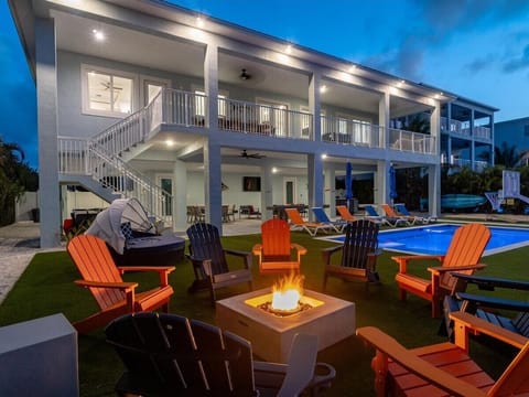 Outdoor lawn with fire pit.