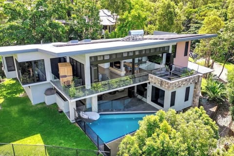 Step into your own lush tropical retreat surrounded by greenery — perfect for relaxing with morning coffee or sunset cocktails.
