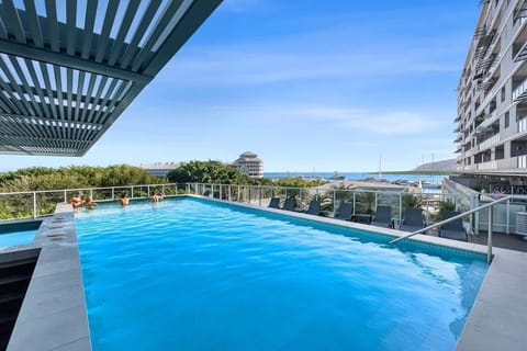 Dive into the swimming pool, surrounded by a spacious deck with stunning views. It's the perfect place to cool off, sunbathe, or simply relax and enjoy the tropical ambience.