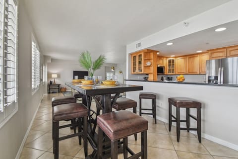 Fully equipped with modern appliances, this kitchen has everything you need to cook meals, including a coffee maker and all essential cookware.
