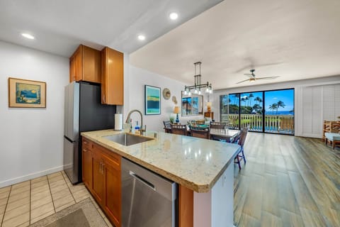 Step into this stunning open-concept kitchen and dining area