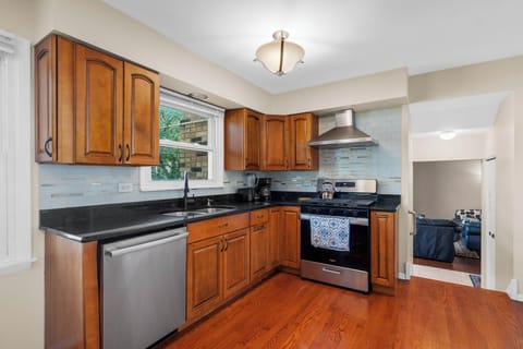Modern kitchen with ample cabinetry and seamless flow.