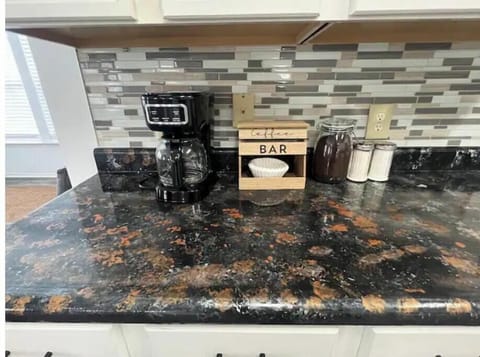 Kitchen with all essentials plus kids’ cutlery. Easy access to living spaces.