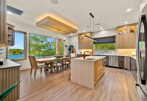 Wake up to tranquil lake views in our modern kitchen—ideal for morning coffee and culinary creations!