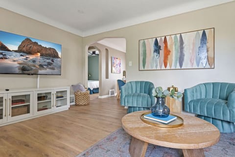 Unwind on this cozy sofa and immerse yourself in entertainment with the 55` TV