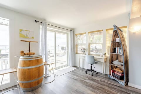 Work or play. Bar top wine barrell, games and books available, or a small desk for those who need to work