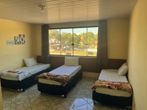 Standard Room, 3 Twin Beds | Blackout drapes, iron/ironing board (on request), WiFi (free)