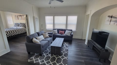 main common area with Bedroom 1 door open