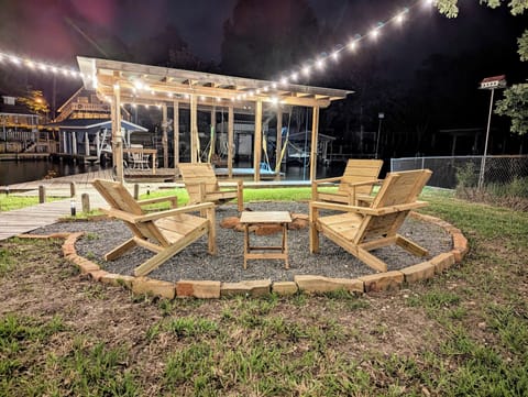 Comfortable Adirondack chairs for you to relax by the fire