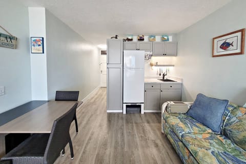 Unit includes a table top that sits 4 people to gather around for meals and/or play table top games and cards.