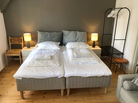 Basic Apartment, 2 Bedrooms, Kitchenette, Garden Area | Frette Italian sheets, premium bedding, pillowtop beds, blackout drapes