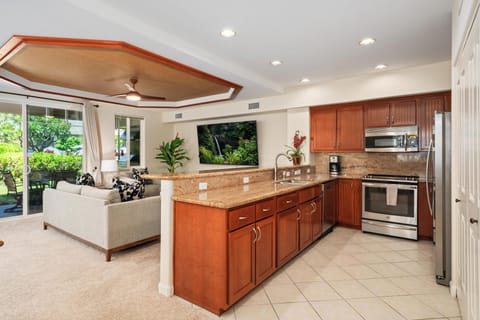 Full kitchen with granite counters and stainless steel appliances