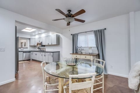 Dining area just off kitchen with dining table that seats four (additional chairs available at the house if needed)