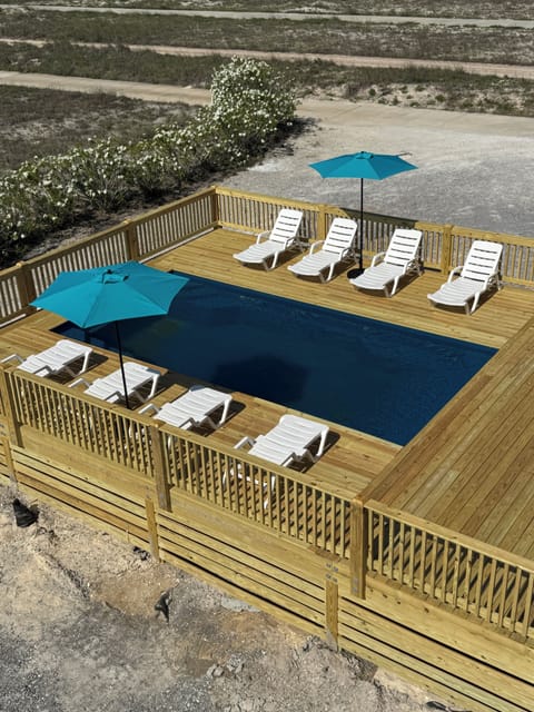 BAND NEW pool! It is shared with only the house next door with a huge deck!