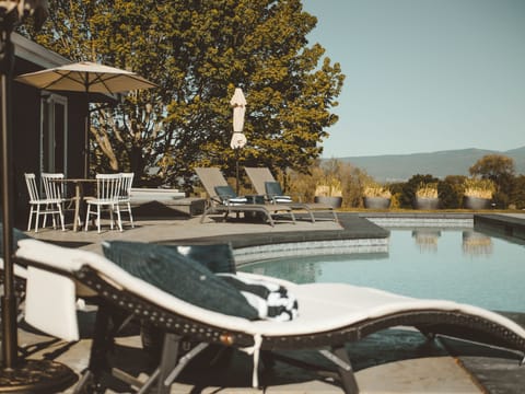 Unwind in paradise – where the serenity of nature meets the tranquility of the pool.