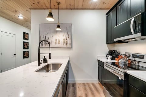 Your Kitchen Paradise awaits! Sleek cabinetry and modern appliances await your culinary creativity!