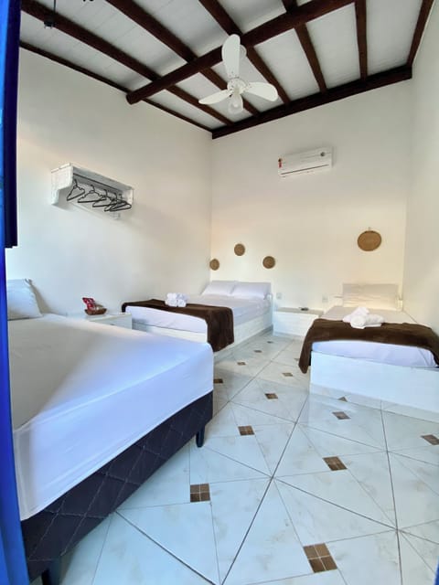 Standard Quadruple Room | Iron/ironing board, free WiFi