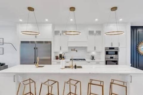 Chef's Kitchen with Large Island, Prep Sink, Full Sink, and Ample Seating