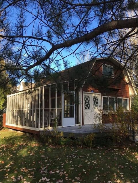 Closed porch perfect for outdoor dining