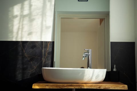 Standard Triple Room | Bathroom | Shower, rainfall showerhead, hair dryer, soap