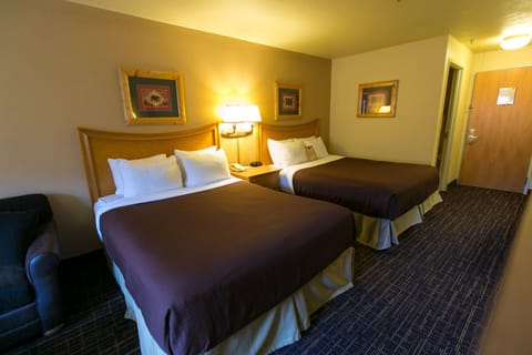 Premium bedding, desk, blackout drapes, iron/ironing board