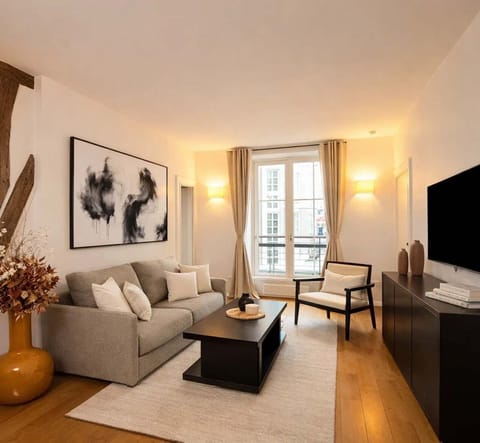 A warm and airy living room with sofa bed
