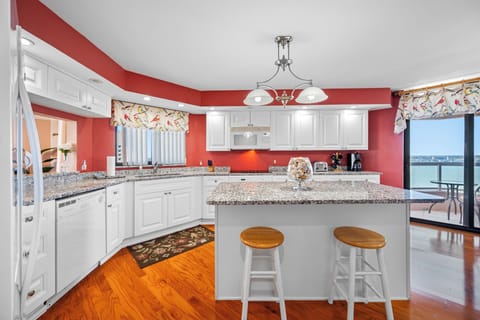 Remodeled kitchen with island & granite countertops