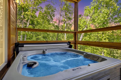 Cabin, 4 Bedrooms | Outdoor spa tub