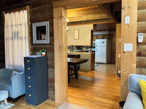 Hallway from TV room through dining room into kitchen