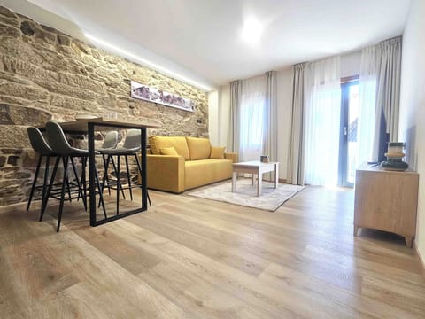 Apartment, 1 Bedroom | Living area | 32-inch Smart TV with digital channels