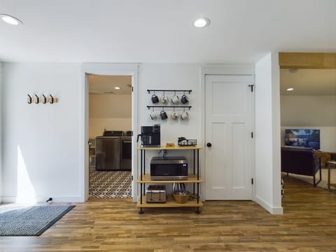 The coffee bar features a Keurig 2-in-one drip and single serve coffee maker.