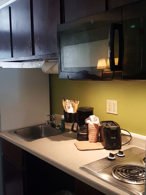 Fridge, microwave, stovetop, coffee/tea maker
