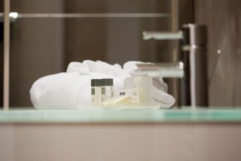 Shower, free toiletries, hair dryer, slippers