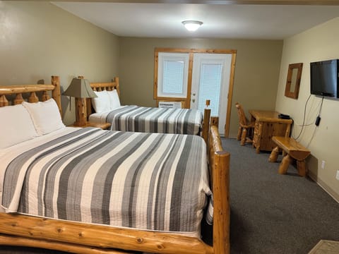 Superior Suite, 2 Queen Beds, Kitchenette | Desk, iron/ironing board (on request), WiFi (free), bed sheets